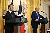 U.S. President Donald Trump and French President Emmanuel Macron hold a joint press conference in the East Room to the White House in Washington, D.C., on Feb. 24. [AFP/YONHAP]