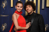 Selena Gomez, left, and Benny Blanco arrive at the 77th Primetime Emmy Awards on Sunday, Sept. 14, at the Peacock Theater in Los Angeles. [AP/YONHAP]