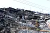 The coastal village area of Yeongdeok County, North Gyeongsang, is blackened by wildfire damage on March 29. [NEWS1]