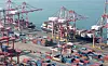Containers are stacked up at a port in Busan on Feb. 26. [YONHAP]