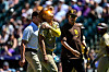 Kim Ha-seong of the San Diego Padres comes out of the game with an apparent upper body injury after sliding to avoid a pickoff attempt at first base in the third inning against the Colorado Rockies at Coors Field in Denver, Colorado on Aug. 18.  [AFP/YONHAP]