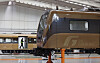 A mechanic inspects a Gimpo Goldline train at a railway depot in October 2023. [YONHAP]
