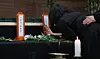 Grieving family members weep at the joint memorial altar for the victims of the Navy patrol aircraft crash, set up at the Navy Air Command gymnasium in Pohang, North Gyeongsang, on May 30. [YONHAP]