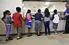 Detained immigrant children line up in the cafeteria at the Karnes County Residential Center, a detention center for immigrant families, in Karnes City, Texas, on Sept. 10, 2014. [AP/YONHAP]