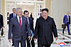 North Korean leader Kim Jong-un, right, and Russian Security Council Secretary Sergei Shoigu walk side by side in this image published by the Korean Central News Agency on June 18. [YONHAP]