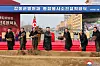 North Korean leader Kim Jong-un, center, attends a groundbreaking ceremony for a regional hospital in Kangdong County in a photo published by the Korean Central News Agency on Feb. 7. [KOREAN CENTRAL NEWS AGENCY]