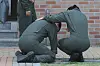 Fellow Navy service members grieve at the joint memorial altar for the victims of the Navy patrol aircraft crash, set up at the Navy Air Command gymnasium in Pohang, North Gyeongsang, on May 30. [YONHAP]