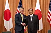 U.S. Secretary of Defense Pete Hegseth, left, shakes hands with Japanese Prime Minister Shigeru Ishiba at the prime minister's office in Tokyo on March 30. [AP/YONHAP]