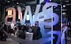 Visitors are seen at the booth of Amazon Web Services (AWS) during the opening of the Hannover Messe industrial trade fair for mechanical and electrical engineering and digital industries in Hanover, Germany, on March 31. [AFP/YONHAP]