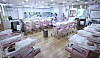 Nurses take care of newborns at a public postpartum care center in Seoul on Dec. 26, 2023. [YONHAP]