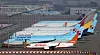 Korean Air and Asiana planes parked at Incheon International Airport on Monday. Korean Air will be acquiring Asiana with help from KDB. [YONHAP]