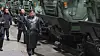 In this footage broadcast by Pyongyang's state-controlled Korean Central Television on Wednesday, North Korean leader Kim Jong-un examines weapons systems manufactured at what state media called 'key munitions plants' during a two-day inspection that began on Monday. [YONHAP]