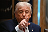 U.S. President Donald Trump speaks during a roundtable event to discuss aid for farmers, in the Cabinet Room of the White House in Washington on Dec. 8. President Trump is announcing a $12 billion aid package for U.S. farmers, targeting a key support base hit by his trade policies. Since Trump's return to the White House in January, many U.S. farmers have been battered by impacts of his wide-ranging tariffs, including retaliatory measures from trading partners. [AFP/YONHAP]