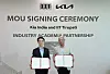 Lee Gwang-gu, left, head of Kia India, and IIT Tirupati Director Kalidindi Satyanarayana pose for a commemorative photo at a cooperation agreement signing ceremony at the Indian technology-focused college on May 9. [KIA]