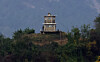 A North Korean soldier stands outside a guard post near the border in Paju, Gyeonggi, on Oct. 16, 2024. [NEWS1]