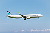 An Air Busan passenger plane is seen flying over Busan on Aug. 14, 2024. [YONHAP]