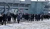 Visitors walk through Gangneung Olympic Park in Gangneung, Gangwon during the Gangwon 2024 Youth Olympics on Tuesday with temperatures dropping below minus 10 degrees Celsius. [YONHAP]