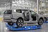 A view of an Ioniq 9 being transported by an automated guided vehicle [HYUNDAI MOTOR]