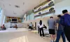 Voters cast their ballots at a polling station set up inside a car dealership in Incheon on June 3, the day of the 21st presidential election. [YONHAP]