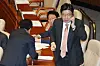 People Power Party floor leader Rep. Kweon Seong-dong speaks on his phone during a plenary session at the National Assembly in Yeouido, western Seoul, on May 1. [NEWS1]
