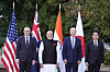 From left, Australian Prime Minister Anthony Albanese, Indian Prime Minister Narenda Modi, U.S. President Joe Biden and Japanense Prime Minister Fumio Kishida stand for a group photo before speaking during the Quad leaders summit at Archmere Academy in Claymont, Delaware, on Saturday. [AP/YONHAP]