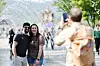 Tourists take a photo on a sunny afternoon in central Seoul on May 12. [YONHAP]