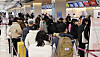Travelers crowd the international terminal at Gimpo Airport in Gangseo District, western Seoul, on Jan. 26. [YONHAP]