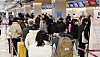 Travelers crowd the international terminal at Gimpo Airport in Gangseo District, western Seoul, on Jan. 26. [YONHAP]
