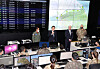 President Yoon Suk-yeol, center left, and U.S. President Joe Biden, center right, speak to troops during a visit to the Korean Air and Space Operations Center (KAOC) at Osan Air Base in Pyeongtaek, Gyeonggi, Sunday afternoon. [JOINT PRESS CORPS]
