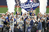 The Los Angeles Dodgers celebrate on the podium after defeating the Toronto Blue Jays in game seven of the 2025 MLB World Series at Rogers Centre in Toronto, Ontario, on Nov. 1. [REUTERS/YONHAP]