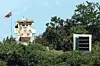 North Korean soldiers stand guard at a post next to a loudspeaker used for anti-South Korea broadcasts, as seen from Jayu-ro in Paju, Gyeonggi, on June 12. [YONHAP]