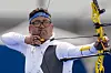 Korea's Kim Woo-jin competes in the Archery mixed team semifinals against India's Ankita Bhakat and Dhiraj Bommadevara in Paris on Friday. [AP/YONHAP]