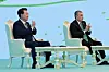 Korean President Yoon Suk Yeol, left, and former Turkmen President Gurbanguly Berdimuhamedow, father of the current president and chairman of the People's Council, clap during a bilateral business forum in Ashgabat, Turkmenistan, on Tuesday. [JOINT PRESS CORPS]