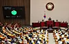 Lawmakers pass a bill to establish a special committee for pension reform during a plenary session at the National Assembly in western Seoul on March 20. [NEWS1]