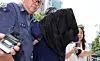A brother-in-law of former Woori Financial Group Chairman Son Tae-seung heads to the Seoul Southern District Court in Yangcheon District, western Seoul, for questioning regarding an illicit loan scandal on Saturday. [NEWS1]