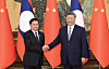 Xi Jinping, general secretary of the Communist Party of China Central Committee and Chinese president, right, meets with Thongloun Sisoulith, general secretary of the Lao People's Revolutionary Party Central Committee and Lao president, at the Great Hall of the People in Beijing on Sept. 4. [XINHUA/YONHAP]