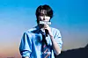 Riize’s Sungchan during a showcase on May 19 at Blue Square in central Seoul for the release of its first full-length album, “Odyssey.” [DANIELA GONZALEZ PEREZ]