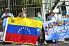 Supporters of ousted Venezuela's President Nicolas Maduro take part in a demonstration outside the Embassy of the Bolivarian Republic of Venezuela in Port of Spain on Jan. 4, a day after he was captured in a U.S. strike. [AFP/YONHAP]