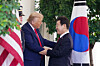 U.S. President Donald Trump, left, greets South Korean President Lee Jae Myung outside the West Wing of the White House in Washington on Aug. 25. [UPI/YONHAP]