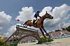 Olivier Perreau of France, riding Dorai D'Aiguilly, competes during the equestrian jumping team final at the Paris Olympics in Versailles, France on Friday. [XINHUA/YONHAP]