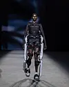 A model wearing a wearable robot walks the runway during Hannah Shin’s 2026 Spring/Summer show at Seoul Fashion Week, held at Dongdaemun Design Plaza in Jung District, central Seoul, on Sept. 5. [SEOUL METROPOLITAN GOVERNMENT]