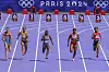 Sha'Carri Richardson of the United States, third left, sprints to win her women's 100-meter round 1 heat at the Stade de France during the 2024 Paris Summer Olympic Games in Paris on Friday. [YONHAP]