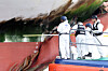 Coast Guard and National Forensic Service officials conduct a forensic examination on the ferry Queen Jenuvia II near Mokpo, South Jeolla on Nov. 20. [YONHAP]