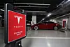 Tesla EVs are charged at a Supercharger in central Seoul. [YONHAP]
