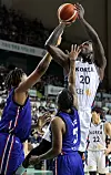 Korea's Ra Gun-a shoots under the basket in front of the opponent's defense in a match against Thailand in a group stage qualifier to the 2025 FIBA Asia Cup at Wonju Gymnasium in Wonju, Gangwon on Sunday. [NEWS1]