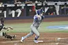 Los Angeles Dodgers infielder Kim Hye-seong hits a single to center field during the fifth inning of an MLB game against the Miami Marlins in Miami on May 6. [AP/YONHAP]