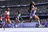 Sha'carri Richardson of the United States, wins a heat in the women's 100-meter run at the 2024 Summer Olympics, Friday, Aug. 2, 2024, in Saint-Denis, France. (AP Photo/David J. Phillip)