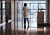 A doctor walks inside a hospital in downtown Seoul on Friday. [YONHAP]