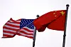 U.S. and Chinese flags flutter outside the building of an American company in Beijing, China April 8. [REUTERS/YONHAP]