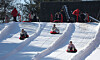 Visitors to a snow sledding range are seen enjoying rides in Yongin, Gyeonggi on Feb. 9. [NEWS1]